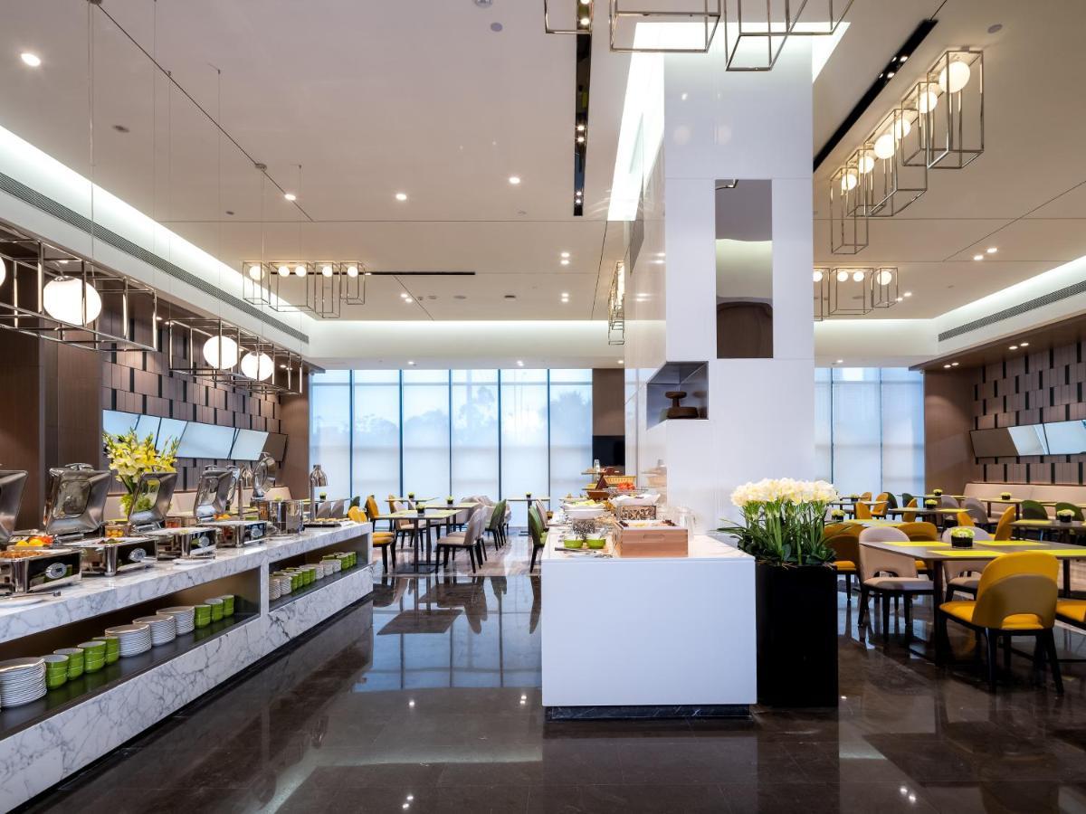 Отель Hampton By Hilton Nanning Wuxiang Экстерьер фото