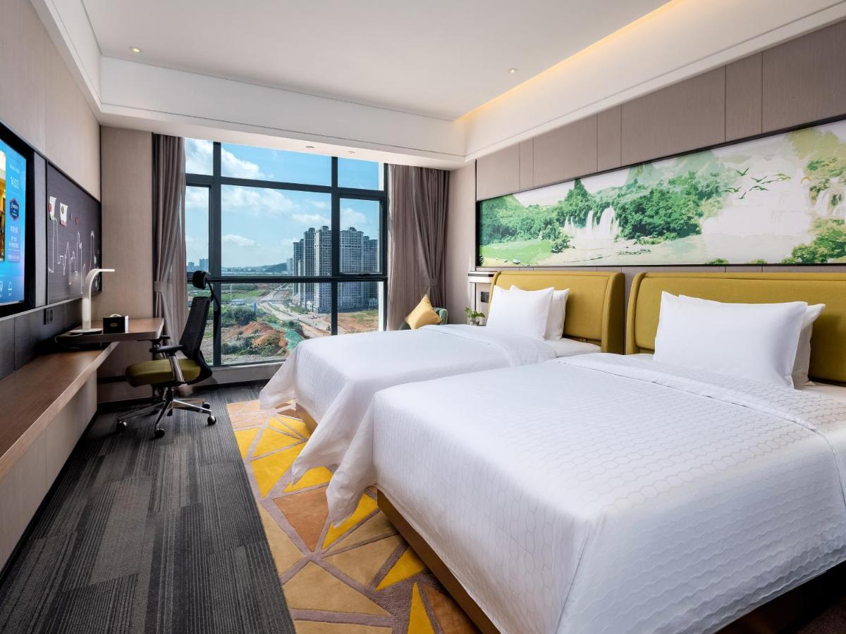 Отель Hampton By Hilton Nanning Wuxiang Экстерьер фото